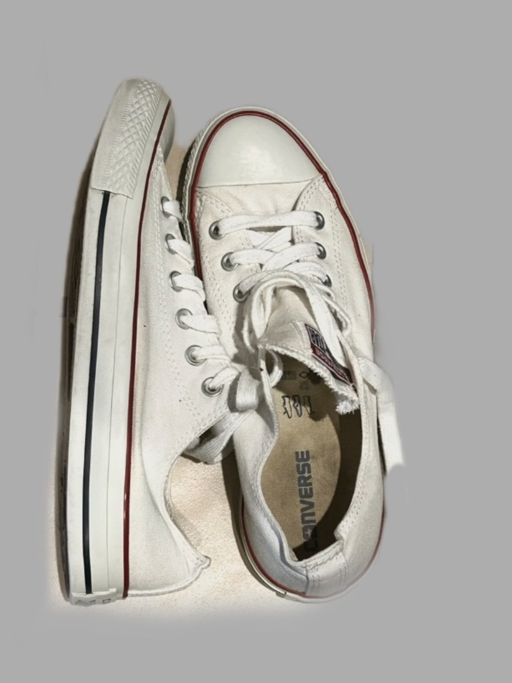 Converse White Low Top Sneakers with Red and Black Trim